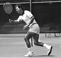 Young Bill Cole playing tennis